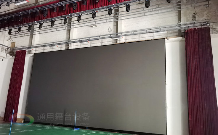 廣州黃花崗禮堂選擇通用舞臺！禮堂舞臺阻燃幕布、吊桿、舞臺燈光項目圓滿竣工！